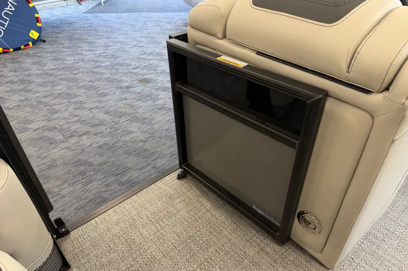Slide: The Image of 2025 Barletta Cabrio 22UC interior with retractable gate and beige seating. - 19