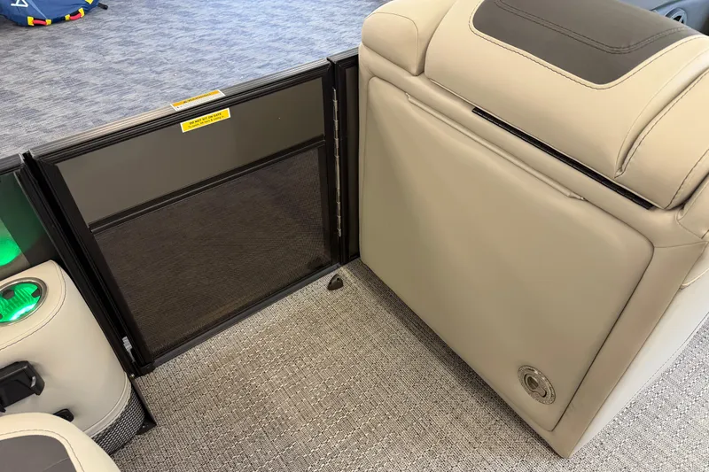 Slide: The Image of 2025 Barletta Cabrio 22UC interior with beige seating and safety gate. - 20