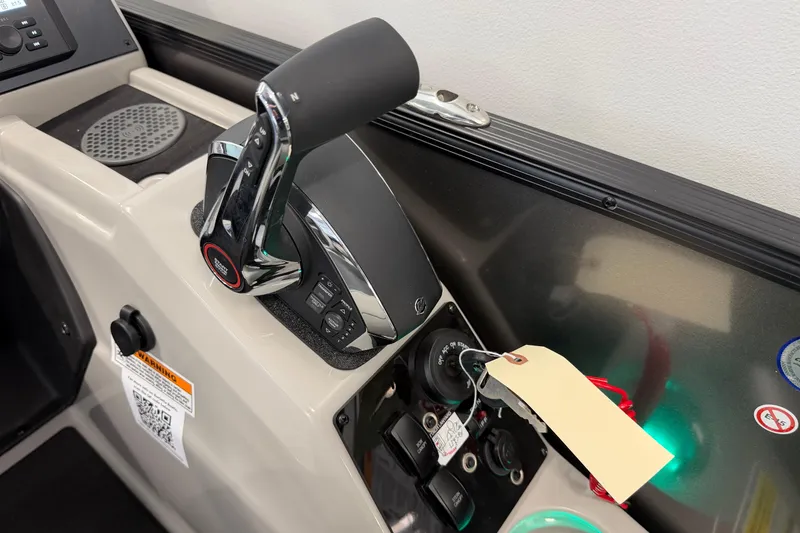 Slide: The Image of Control panel of 2025 Barletta Cabrio 22UC boat with throttle and ignition. - 29