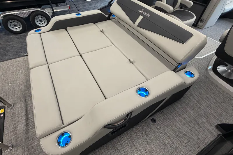Slide: The Image of 2025 Barletta Cabrio 22UC boat interior with luxurious seating and illuminated cup holders. - 7
