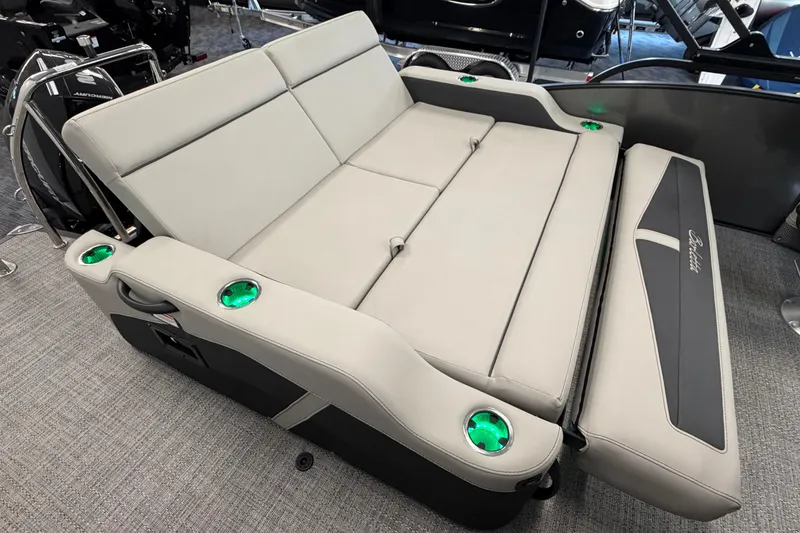 Slide: The Image of Luxurious seating on 2025 Barletta Cabrio 22UC boat, featuring comfortable cushions and integrated cup holders. - 9