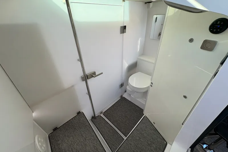 Slide: The Image of Modern bathroom interior of 2026 Axopar 37 XC Cross Cabin boat. - 44