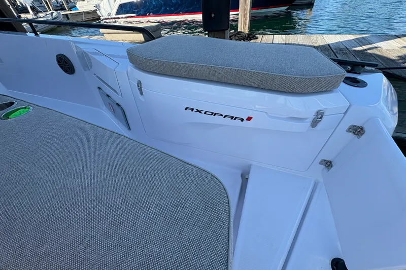 Slide: The Image of 2026 Axopar 37 XC Cross Cabin boat interior with cushioned seating and sleek design. - 13