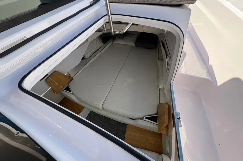 Slide: The Image of Interior cabin view of 2026 Axopar 37 XC Cross Cabin, featuring cozy sleeping area. - 30