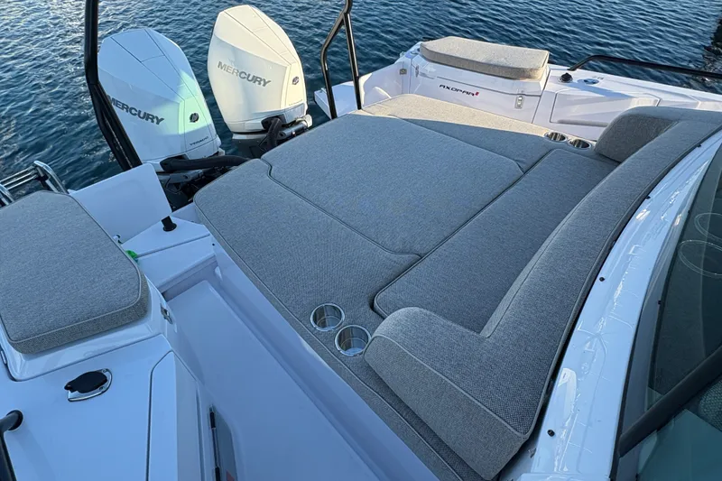 Slide: The Image of 2026 Axopar 37 XC Cross Cabin with Mercury engines, featuring spacious sunbed and sleek design. - 60