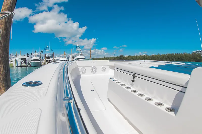 Slide: The Image of Manufacturer Provided Image: 2025 SeaHunter 41 CTS boat docked under clear blue sky. - 4