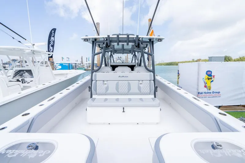 Slide: The Image of Manufacturer Provided Image: 2025 SeaHunter 41 CTS boat interior, featuring spacious seating and modern design. - 5