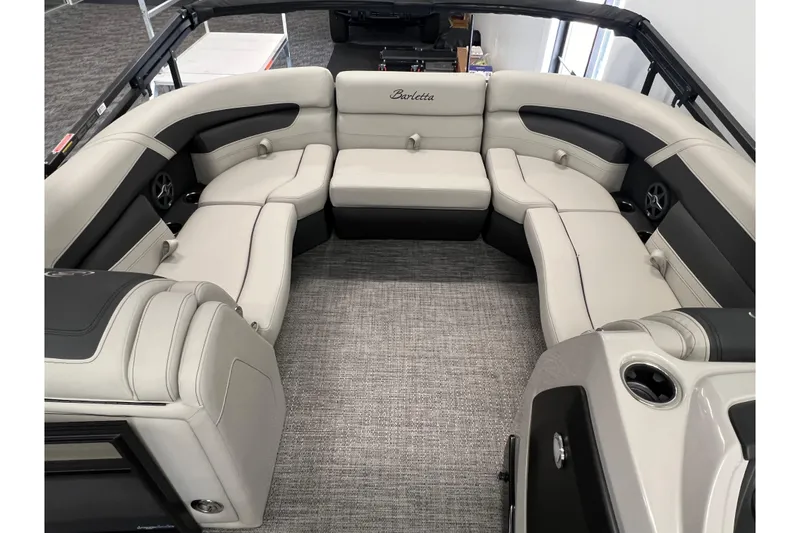 Slide: The Image of Luxurious interior of 2025 Barletta Cabrio 22UC pontoon boat with plush seating. - 12