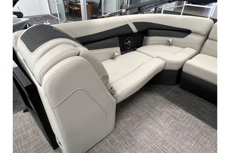 Slide: The Image of 2025 Barletta Cabrio 22UC boat interior with luxurious beige seating and modern design. - 13