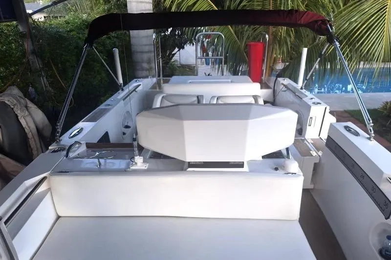 Slide: The Image of 2013 NOVURANIA OF AMERICA Chase 23 boat interior with seating and canopy. - 5