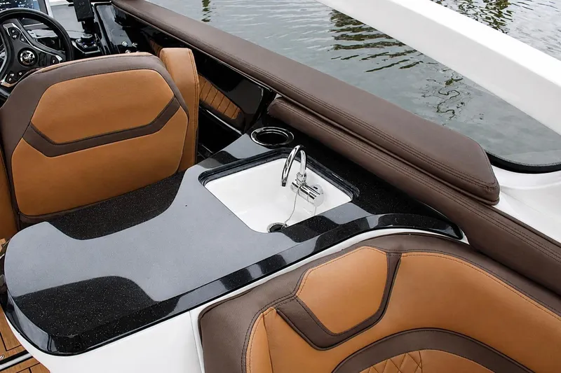 Slide: The Image of Luxurious interior of 2024 Yamaha 275 SD boat with sleek seating and modern sink. - 10