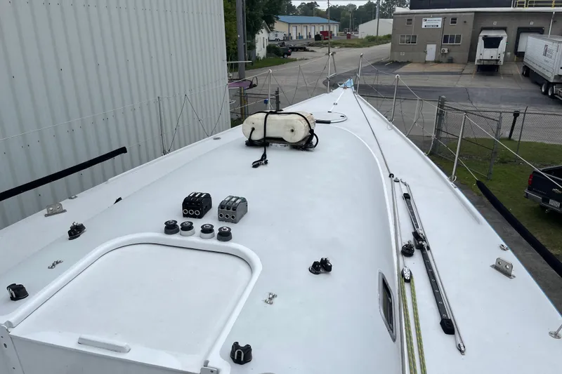 Slide: The Image of Deck view of a 1994 Nelson Marek 43 sailboat, showcasing rigging and fittings. - 5