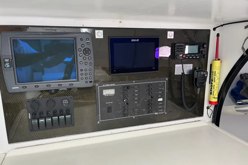 Slide: The Image of Control panel of a 1994 Nelson Marek 43 yacht with navigation and communication equipment. - 8