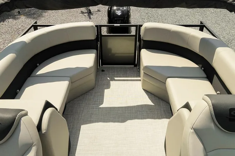 Slide: The Image of 2026 Dockside Pontoons 22DQ interior with beige seating and spacious layout. - 13