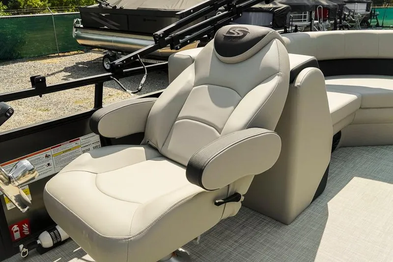 Slide: The Image of Luxurious captain's chair on 2026 Dockside Pontoons 22DQ boat, featuring ergonomic design and premium materials. - 16