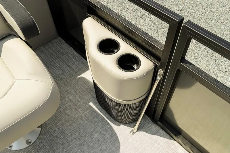 Slide: The Image of Cup holders on 2026 Dockside Pontoons 22DQ boat, featuring sleek interior design. - 17