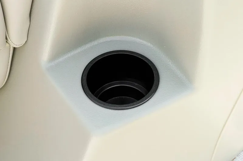 Slide: The Image of Cup holder in 2026 Dockside Pontoons 22DQ boat, featuring beige interior design. - 27