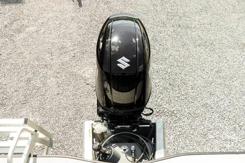 Slide: The Image of Outboard motor on 2026 Dockside Pontoons 22DQ, gravel background. - 29
