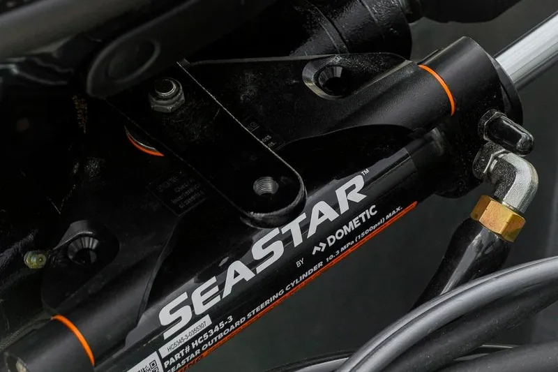 Slide: The Image of Close-up of SeaStar hydraulic steering cylinder on Dockside Pontoons 22DQ, 2026 model. - 30