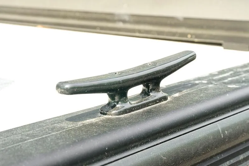 Slide: The Image of Close-up of a cleat on a 2026 Dockside Pontoons 22DQ boat. - 32