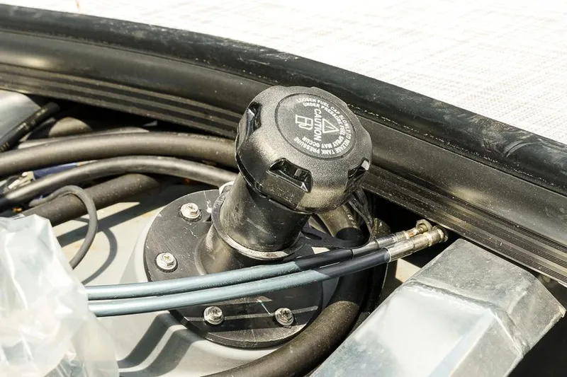 Slide: The Image of Fuel cap and hoses on a 2026 Dockside Pontoons 22DQ boat. - 5
