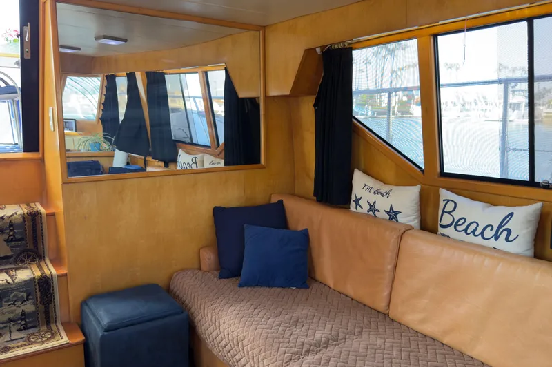 Slide: The Image of Cozy interior of 1993 Novatec 44 yacht with nautical-themed decor and comfortable seating. - 10