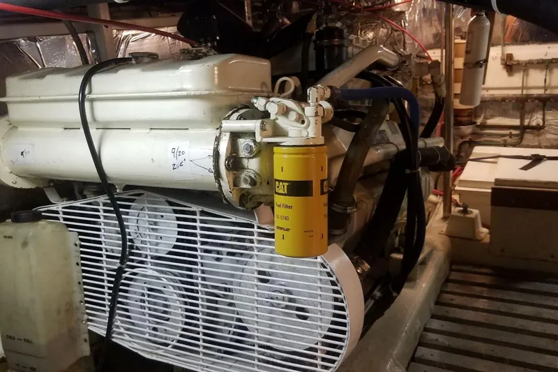 Slide: The Image of Engine room of a 1993 Novatec 44 boat with visible CAT fuel filter. - 19