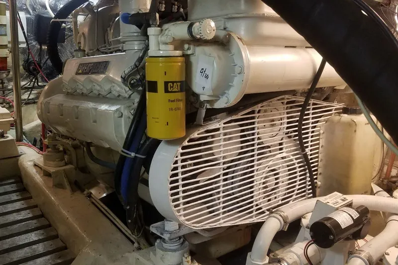 Slide: The Image of Engine room of a 1993 Novatec 44 yacht with CAT fuel filter visible. - 23