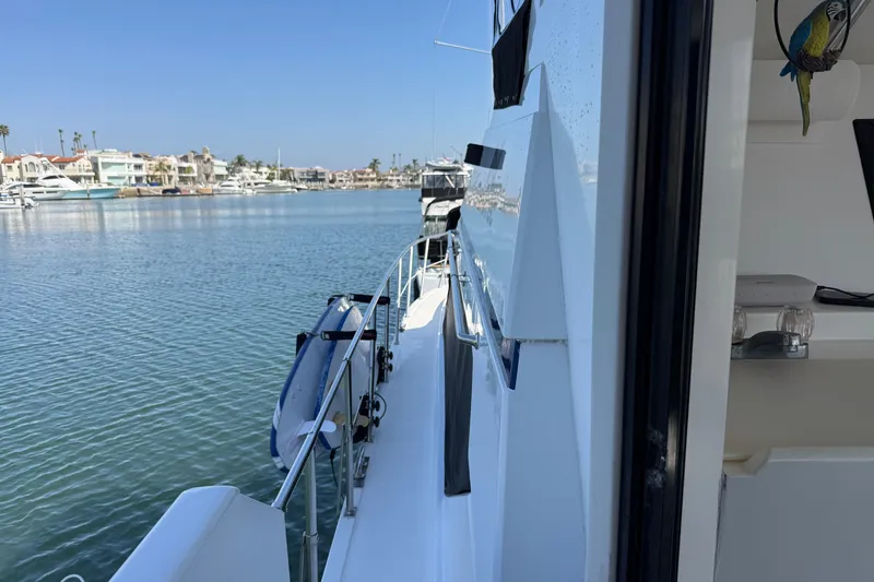 Slide: The Image of Side view of a 1993 Novatec 44 yacht docked in a marina. - 3