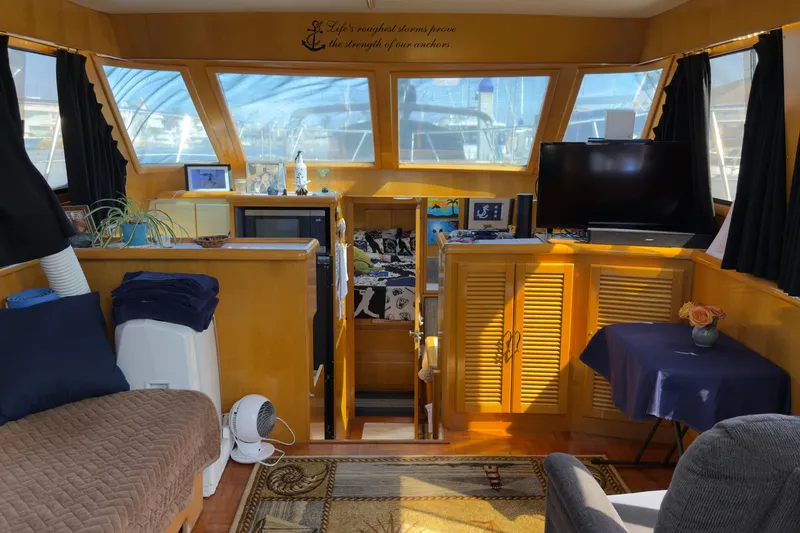 Slide: The Image of Cozy interior of a 1993 Novatec 44 yacht with wood accents and modern amenities. - 9