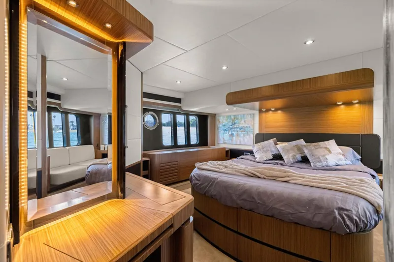 Slide: The Image of Luxurious interior of 2018 Absolute Navetta 52 yacht with elegant wood finishes and cozy bedding. - 20