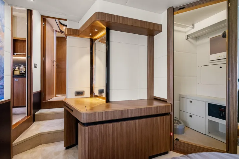 Slide: The Image of Luxurious interior of 2018 Absolute Navetta 52 yacht featuring modern wood finishes and elegant design. - 25