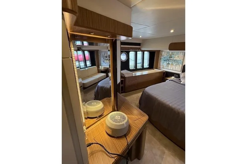 Slide: The Image of Luxurious interior of 2018 Absolute Navetta 52 yacht with elegant bedroom and seating area. - 15
