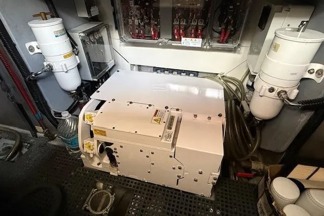 Slide: The Image of Engine room of 2018 Absolute Navetta 52 yacht, showcasing machinery and components. - 31