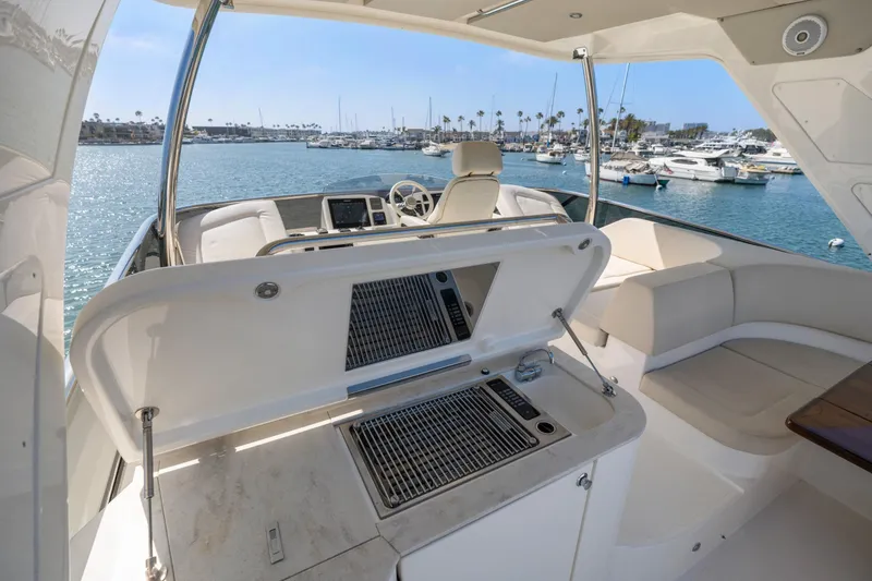 Slide: The Image of Luxurious 2018 Absolute Navetta 52 yacht interior with modern amenities, docked in a scenic marina. - 40