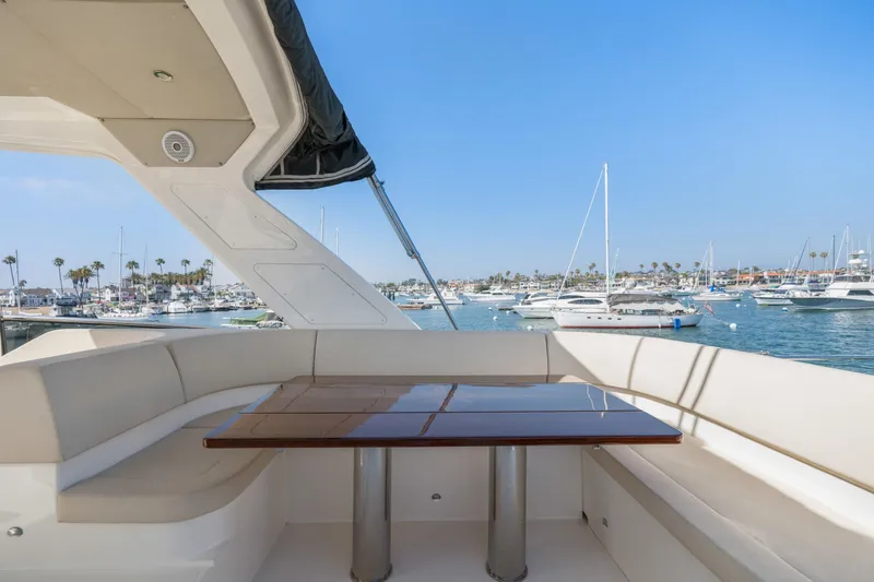 Slide: The Image of 2018 Absolute Navetta 52 yacht on dry dock under clear blue sky. - 46