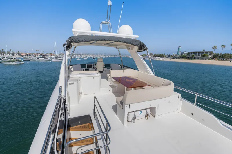Slide: The Image of 2018 Absolute Navetta 52 yacht under maintenance, showing hull and propeller details. - 48