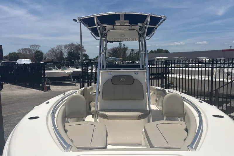 Slide: The Image of 2024 Key West 219 FS boat with sleek design, spacious seating, and modern features. - 4