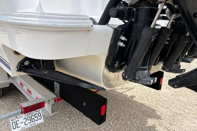 Slide: The Image of 2007 Donzi 38 ZF Open boat on trailer, North Carolina license plate visible. - 11