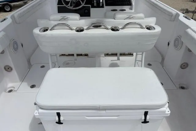 Slide: The Image of 2007 Donzi 38 ZF Open boat interior with white seating and console. - 27