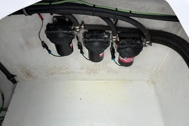 Slide: The Image of Fuel filters in the engine compartment of a 2007 Donzi 38 ZF Open boat. - 37