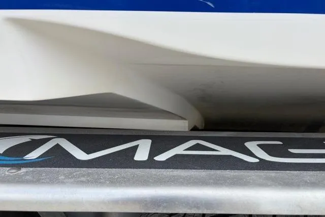Slide: The Image of 2007 Donzi 38 ZF Open boat detail with "MAG" branding visible. - 5