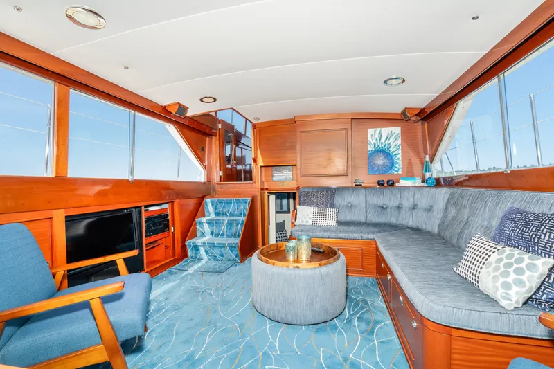 Slide: The Image of Luxurious interior of a 1965 Chris-Craft 57 Constellation yacht with elegant seating and decor. - 22