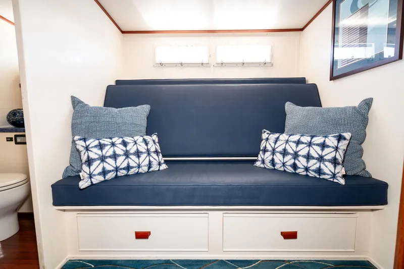 Slide: The Image of Interior of 1965 Chris-Craft 57 Constellation with blue seating and decorative pillows. - 45