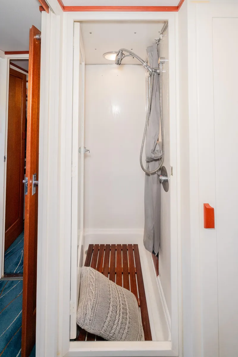Slide: The Image of Shower area in 1965 Chris-Craft 57 Constellation yacht with wooden floor slats. - 49