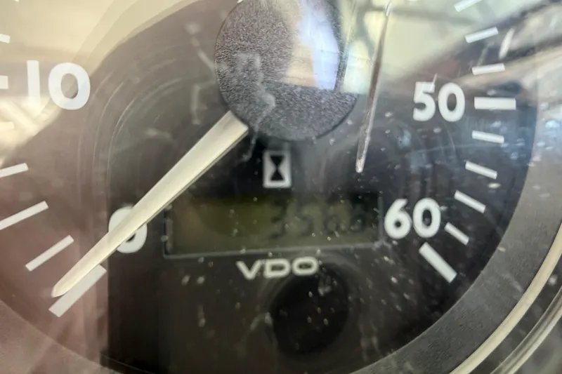 Slide: The Image of Close-up of a 2003 Formula 330 Sun Sport speedometer displaying 251.0 hours. - 24
