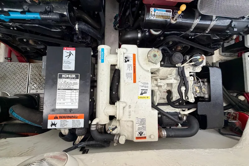 Slide: The Image of Engine compartment of a 2003 Formula 330 Sun Sport with Kohler generator. - 28