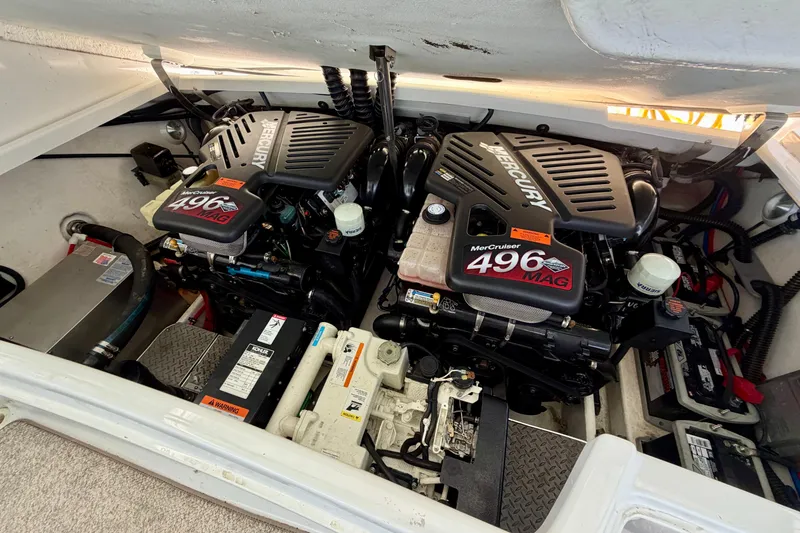 Slide: The Image of Engine compartment of a 2003 Formula 330 Sun Sport with twin MerCruiser 496 MAG engines. - 29
