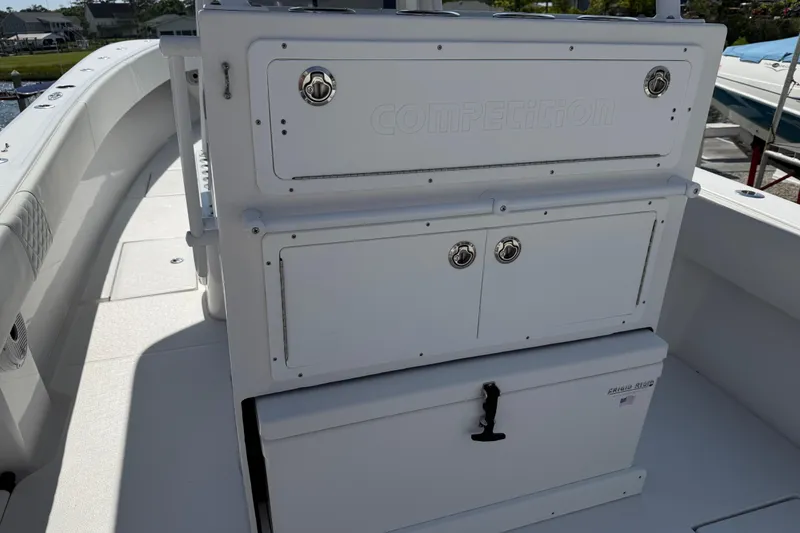 Slide: The Image of 2021 Competition 31 boat interior with storage compartments and seating. - 15