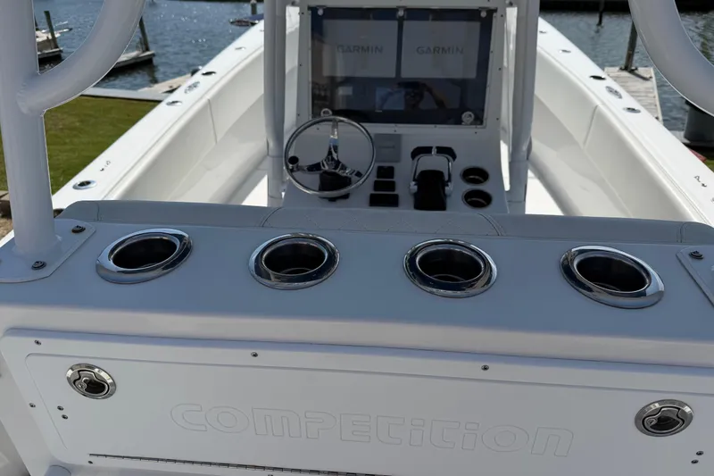 Slide: The Image of Center console of a 2021 Competition 31 boat with Garmin displays. - 19